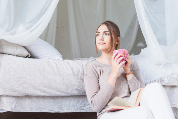 Peaceful morning routine with sunlight, journaling, and coffee for better productivity and mental clarity.